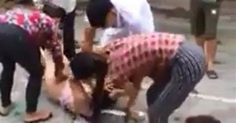 Scorned Wife Strips Husband S Mistress Naked Then Cuts Her Hair After Catching The Pair In Bed