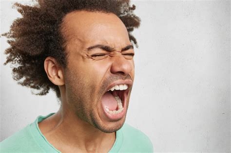 Free Photo Close Up Portrait Of Mad Angry Young Dark Skinned Male