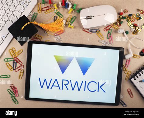 In this photo illustration, The University of Warwick logo seen ...