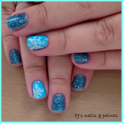 Frozen Inspired Nails Blue Glitter And Snowflake Shellac Snowflake