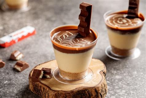 Premium Photo Kinder Chocolate Cheesecake Served In Cup Isolated On