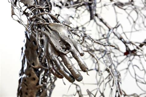 The transience of human life is captured in fragmented metal sculptures ...