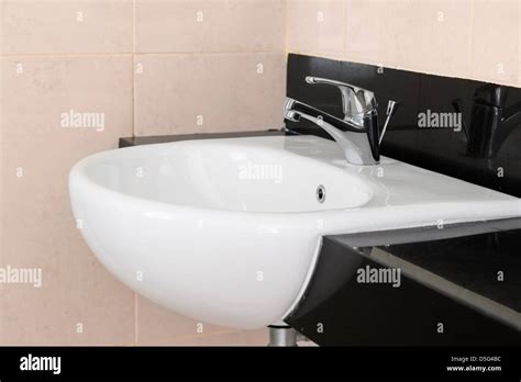 Modern Ceramic Hand Wash Basin With Chrome Water Mixer Tap In Hotel