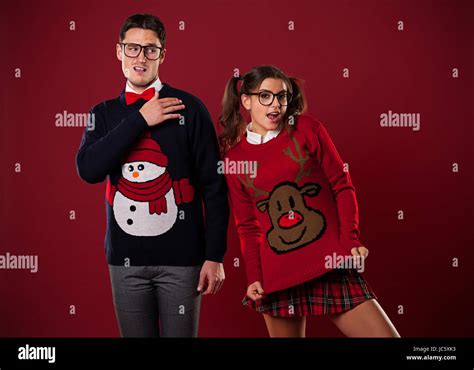 Crazy Nerd Couple In Funny Sweaters Goofing Around Stock Photo Alamy