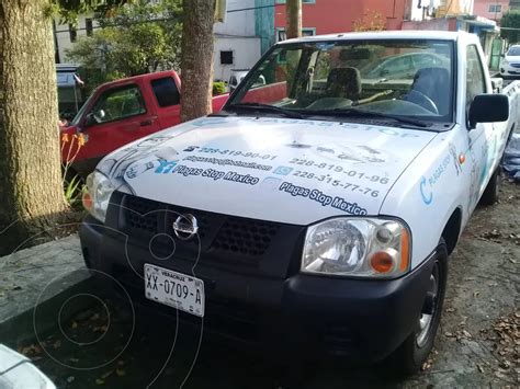 Nissan NP300 2 4L Pick Up Dh Usado 2011 Color Plata Precio 189 000