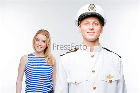 Фотография на тему Морской капитан и молодая красивая женщина | PressFoto