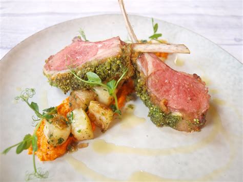 Herb Crusted Lamb Rack With Romesco Sauce Saute Potatoes And Pea