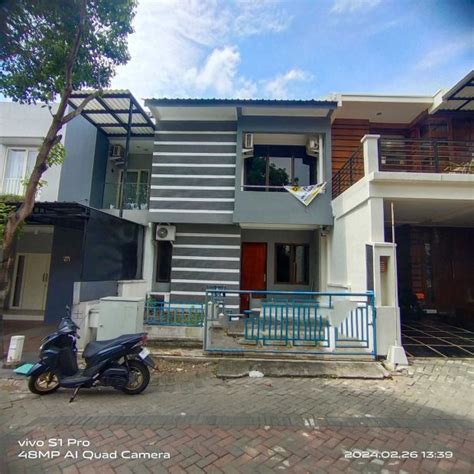 Rumah Taman Puspa Raya Citraland Surabaya