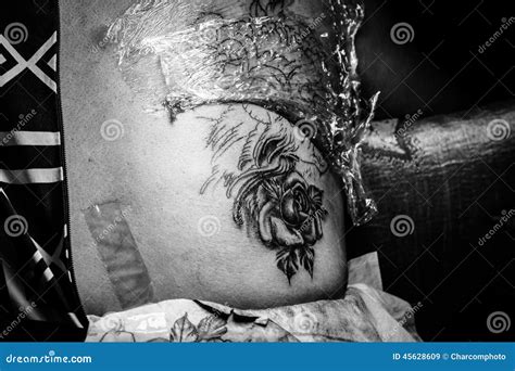 Tattooer Showing Process of Making a Tattoo Editorial Stock Image ...