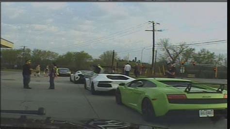 Police Dashcam Video Captures Pack Of Exotic Sports Cars Speeding Down