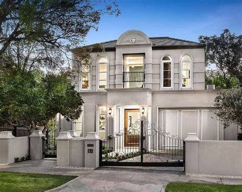 Traditional Gray Stucco Front Balcony Contemporary House