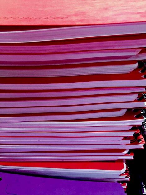 Premium Photo Stack Of Spiral Notebooks On Table