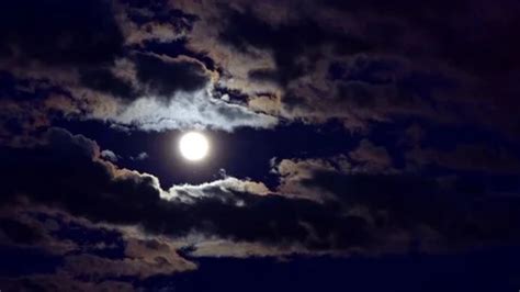 Night cloudy sky with full moon on a clo... | Stock Video | Pond5