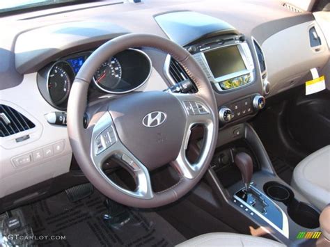 Taupe Interior 2011 Hyundai Tucson GLS AWD Photo #42085663 | GTCarLot.com