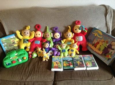 HUGE 26 piece TELETUBBIES lot! game, movies, toy, dolls, puzzles, book ...