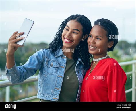 Two African American Girls With Indigenous Features Take A Selfie