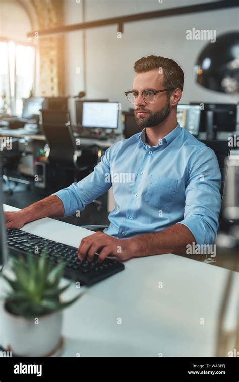 Concentrated Businessman Young Bearded Man In Eyeglasses And Formal