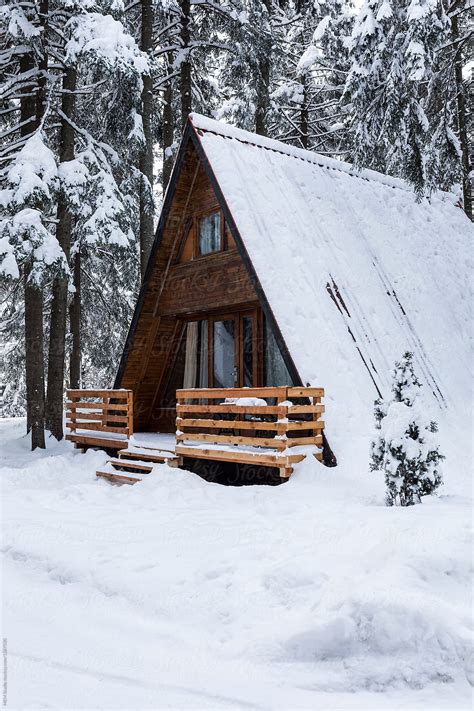 "Small Hut In The Snow" by Stocksy Contributor "MEM Studio" - Stocksy