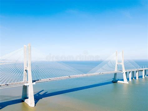 Traffic on Vasco Da Gama Bridge Over the Tagus at Sunset in Lisbon, Portugal, Aerial View. Stock ...