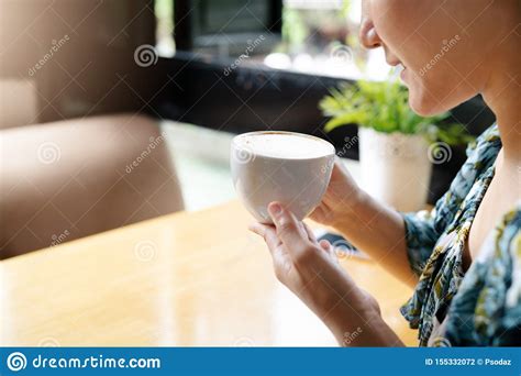 Women Hands Holding Hot Cup Of Coffee Or Tea In Morning Sunlight Stock Photo Image Of Food