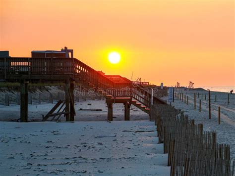 Sunrise On Fire Island Looking Over Raised Boardwalks And Sand Dunes