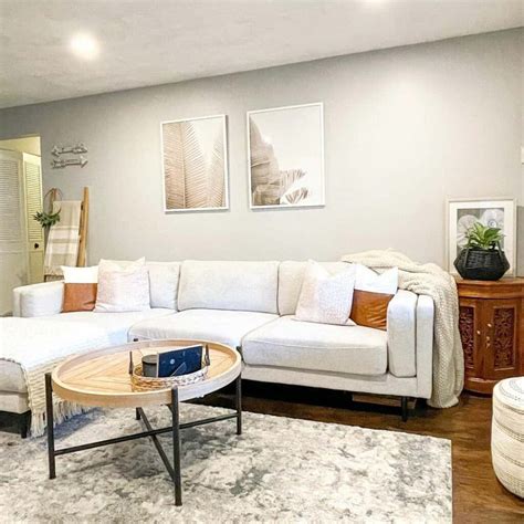 Pristine Living Room With A White Sectional Sofa Soul Lane