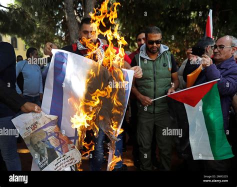 Palestinians Burn Posters That Shows A Portrait Of Arthur Balfour The