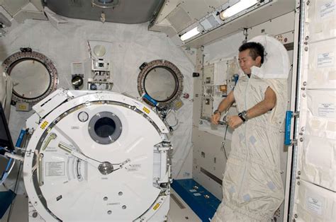 Astronaut Sleeping In Space