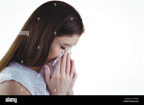 Sick Brunette Blowing Her Nose Stock Photo Alamy