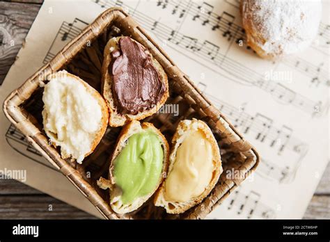 Homemade Profiteroles On The Music Sheet With Notes Profiteroles