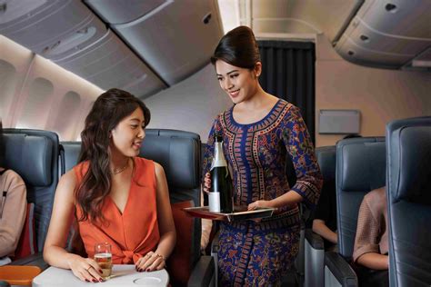 singapore airlines enhances premium economy class  flight experience