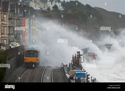 Stormy Weather Brings Waves Crashing Over Trains At Dawlish Devon Uk