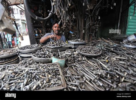 Sellers Sell Old Car Parts At The Old Car Parts Market In Dholaikhal