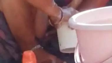 Dehati Bhabhi Bathing Topless On The Terrace Indian Sex Video