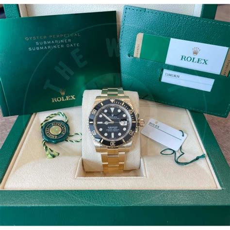 Rolex Submariner 116618 18 Ct Yellow Gold Black Index Dial The Wrist