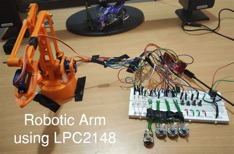 DIY Pick and Place Robotic Arm using ARM7-LPC2148 ARM Microcontroller