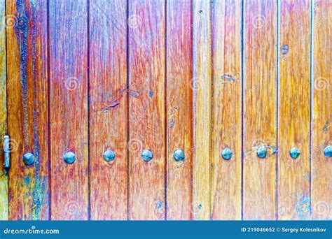 Antique Wooden Door With Iron Hinges And Nails Faded Brown Boards