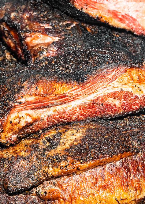 Smoked Brisket By Stocksy Contributor J Anthony Stocksy