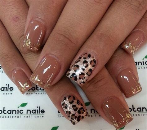 Light Brown Nails With Gold Glitter And Leopard Print Accent Nail