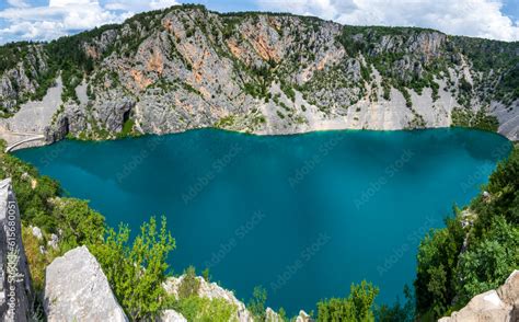 Blue Lake Called Modro Jezero At Imotski In Croatia Stock Photo