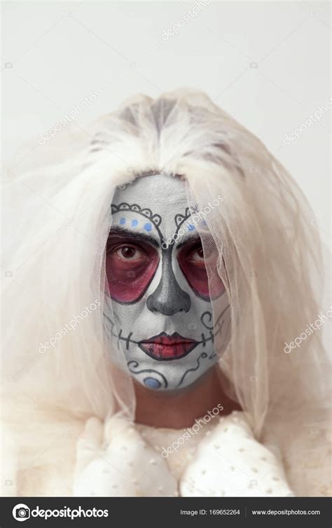 Bride with a mexican calaveras makeup Stock Photo by ©nito103 169652264