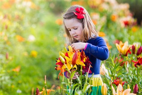 287 Little Girl Day Lilies Stock Photos Free And Royalty Free Stock