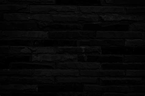 Old Black Brick Wall Texture For Background With Copy Space For Design