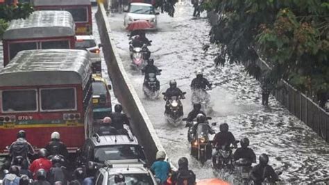 Monsoon Live Heavy Rain Lashes Mumbai Severe Waterlogging In Several