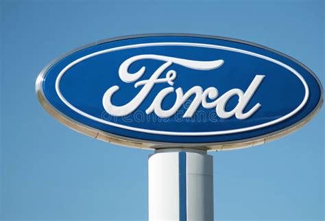 Ford Dealership Sign and Logo Against Blue Sky, Detroit, October 17, 2017 Editorial Stock Image ...