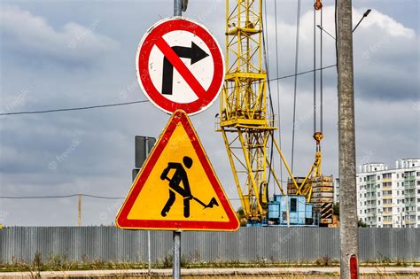 Premium Photo | Road sign about construction and repair work ...