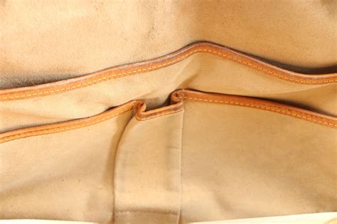 Louis Vuitton Rivoli Briefcase In Monogram Canvas And Leather