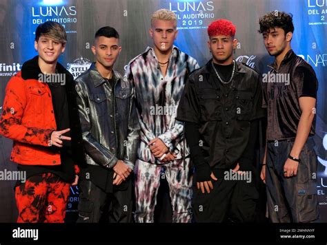 Members Of The Us Band Cnco Pose For Photographers As They Arrive For