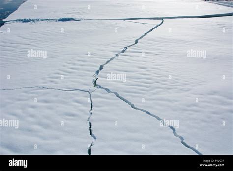 Antarctica. Near Adelaide Island. The Gullet. Cracks open in the ice ...