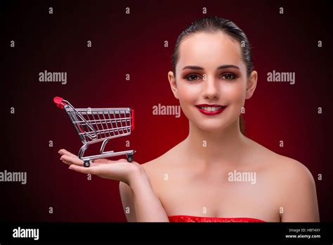 Young Woman With Shopping Cart Stock Photo Alamy